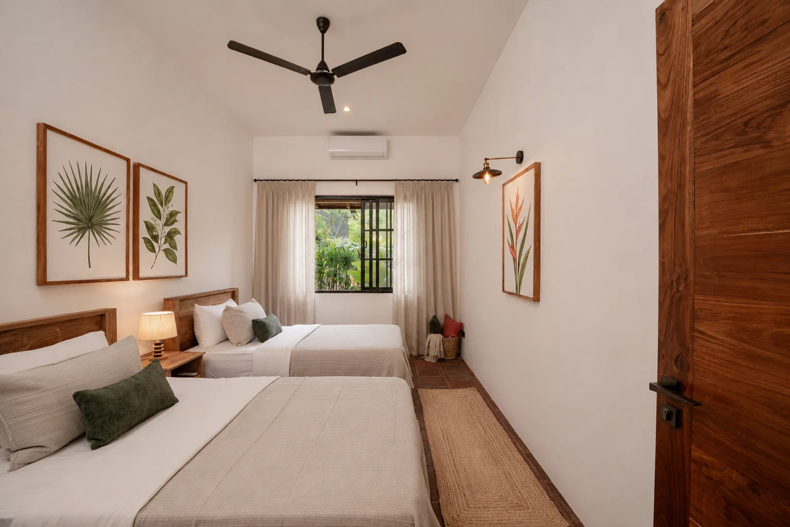 Twin bedroom with botanical artworks and tropical garden view